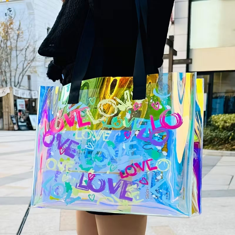 Handbags - ファッショナブルなレーザープリントのハンドバッグ。PVCゼリー素材で作られており、女性の日常使いに最適です。デート、スポーツイベント、コンサート、カジュアルな外出、お祭りの日に最適で、水泳用バッグとしても使用できます。